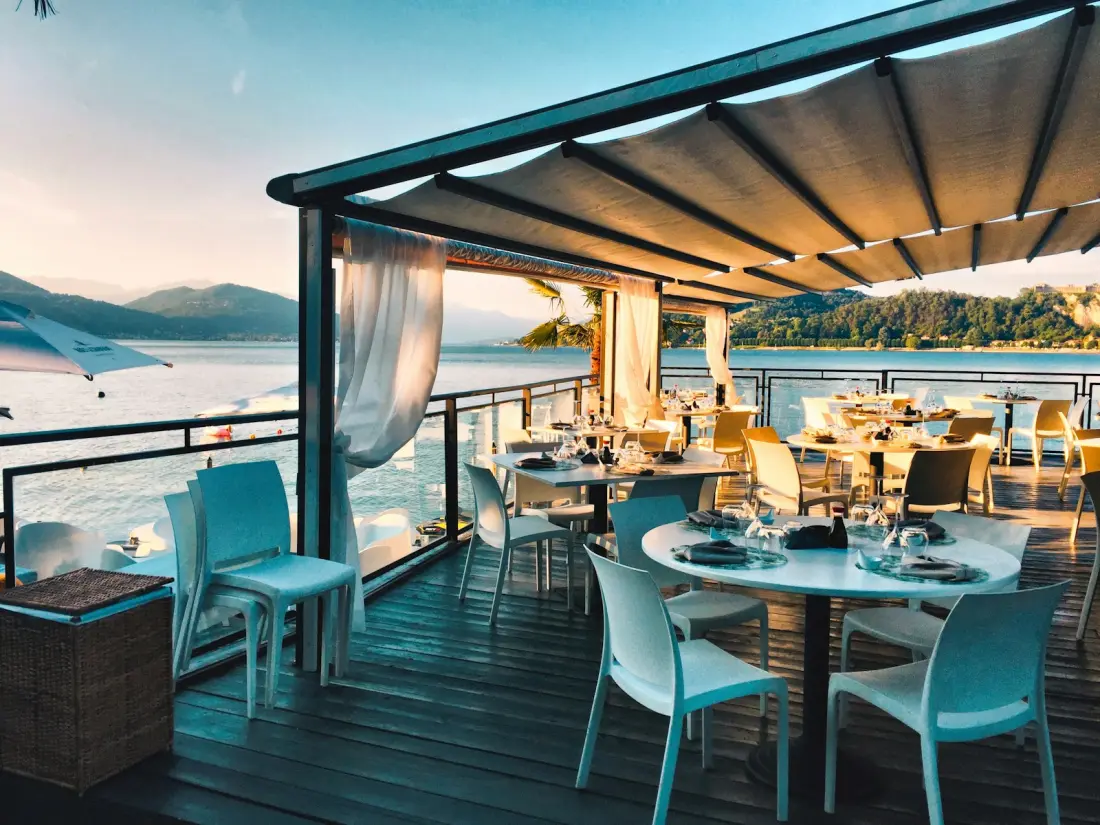 Hotel restaurant terrace overlooking the water
